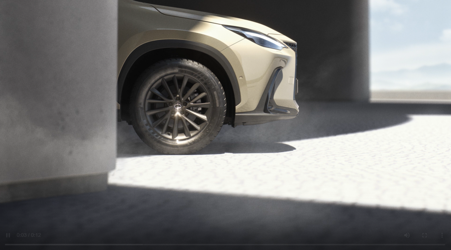 Lexus LX driving around a corner in a city location 